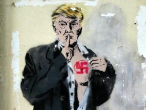 ee.uu-Anti-Trump-graffiti-London-scaled-1