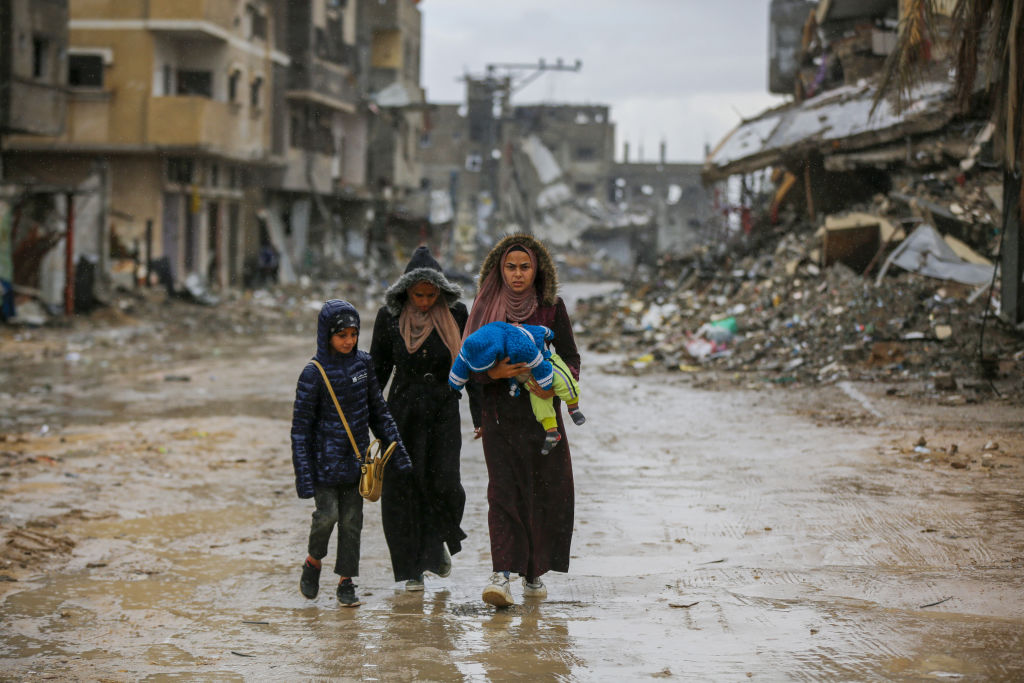 Palestinians return to Nuseirat Refugee Camp after the ceasefire and find huge devastation